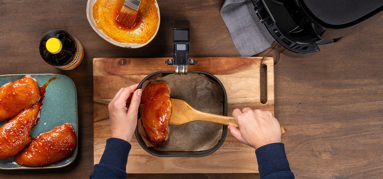 Leckeres Hähnchen in einem Airfryer Korb